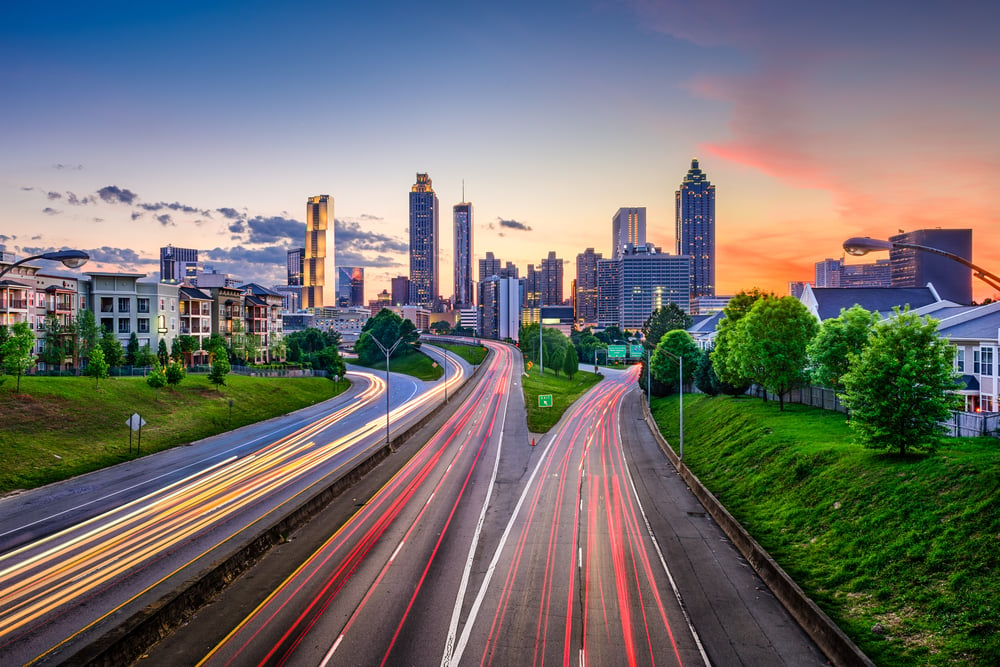 Atlanta, Georgia, USA downtown city skyline over Freedom Parkway